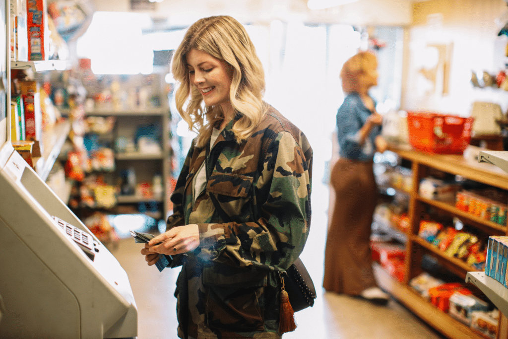 customer using atm at Convenience store